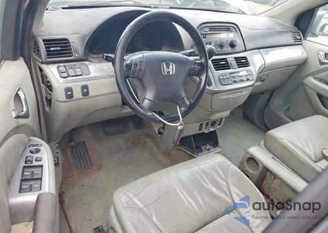 2009 Honda Odyssey Exl z USA, uszkodzony, nr VIN 5FNRL38689B001307